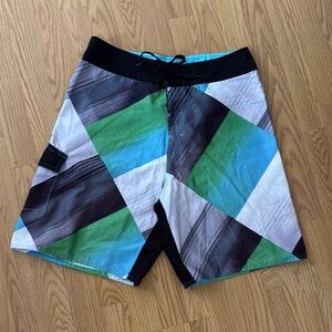 Burnside Green and Blue Board Shorts with Geometric Design